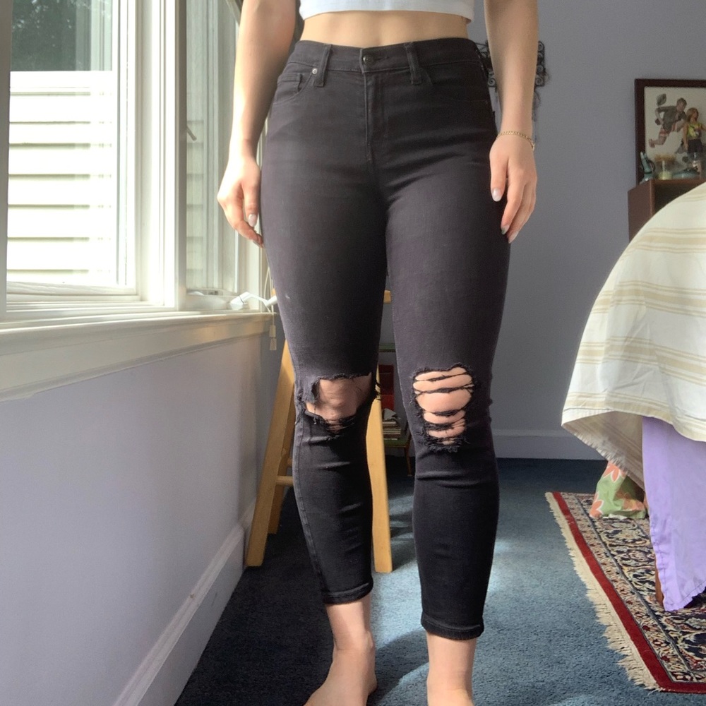 Topshop Petite ripped Jamie skinny jeans in black